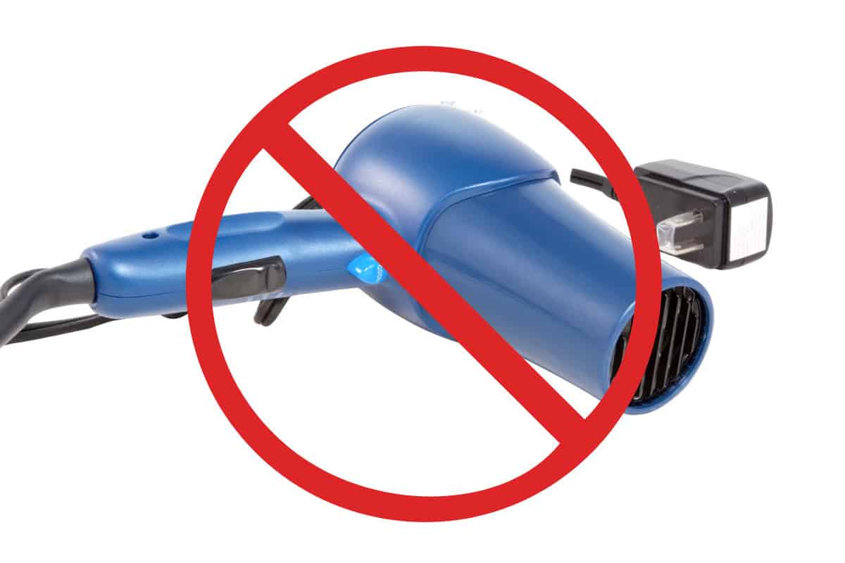 solo-stove-got-rained-on-faqs Image of a hair dryer crossed out for a blog post explaining wht to do if a Solo Stove gets rained on.