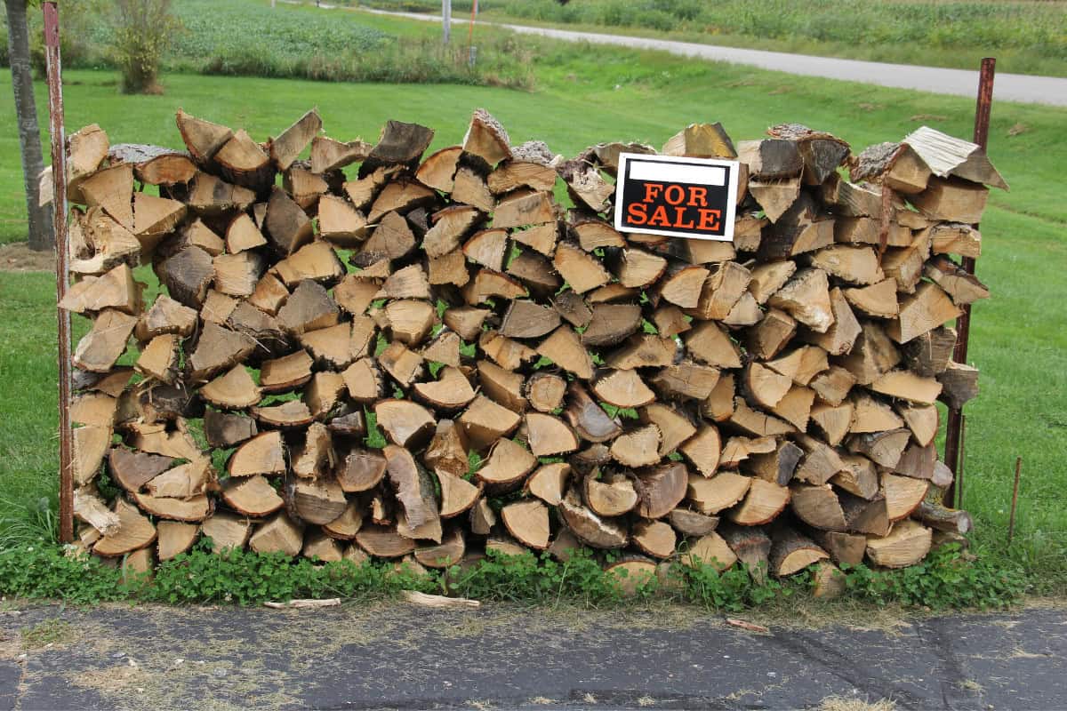 us-firewood-prices-smart Image of stacked firewood for sale.