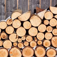 Image of wood stacked for a fire pit blog article