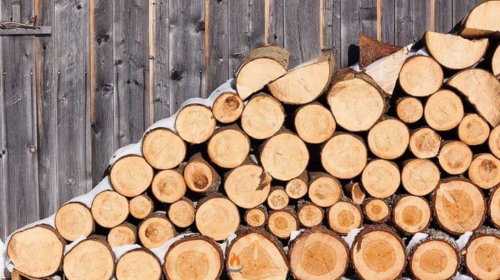 Image of wood stacked for a fire pit blog article
