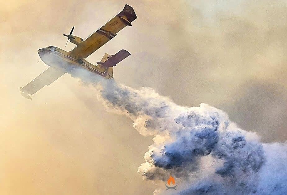 Image of airplane putting out a fire