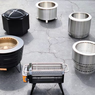 Image of a collection of smokeless fire pits on asphalt for a blog post covering smokeless fire pit advantages.