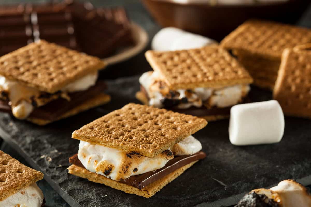 marshmallows-over-a-gas-fire-pit-fun Image of smores ready to eat.