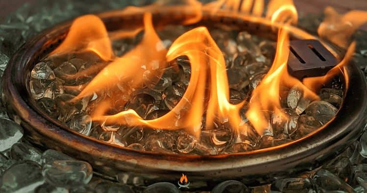 Image of a gas fire pit burner and fireglass