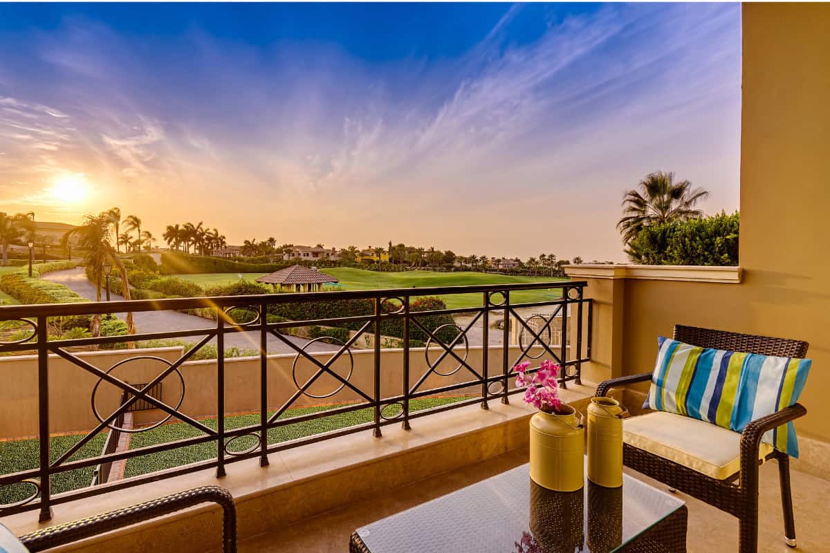 fire-pit-on-a-balcony-closing Image of condo balcony overlooking a golf course.
