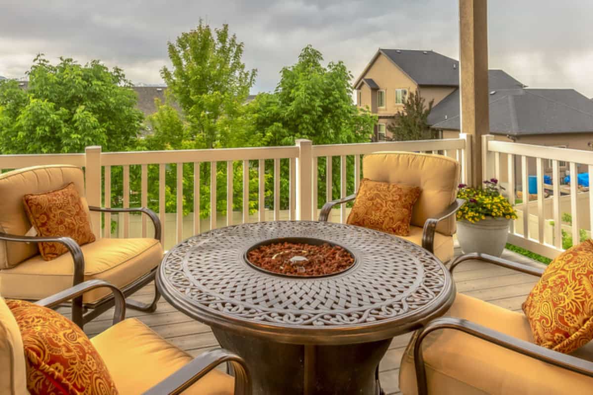 fire-pit-on-a-balcony-considerations Image of a large round propane fire pit on a balcony.