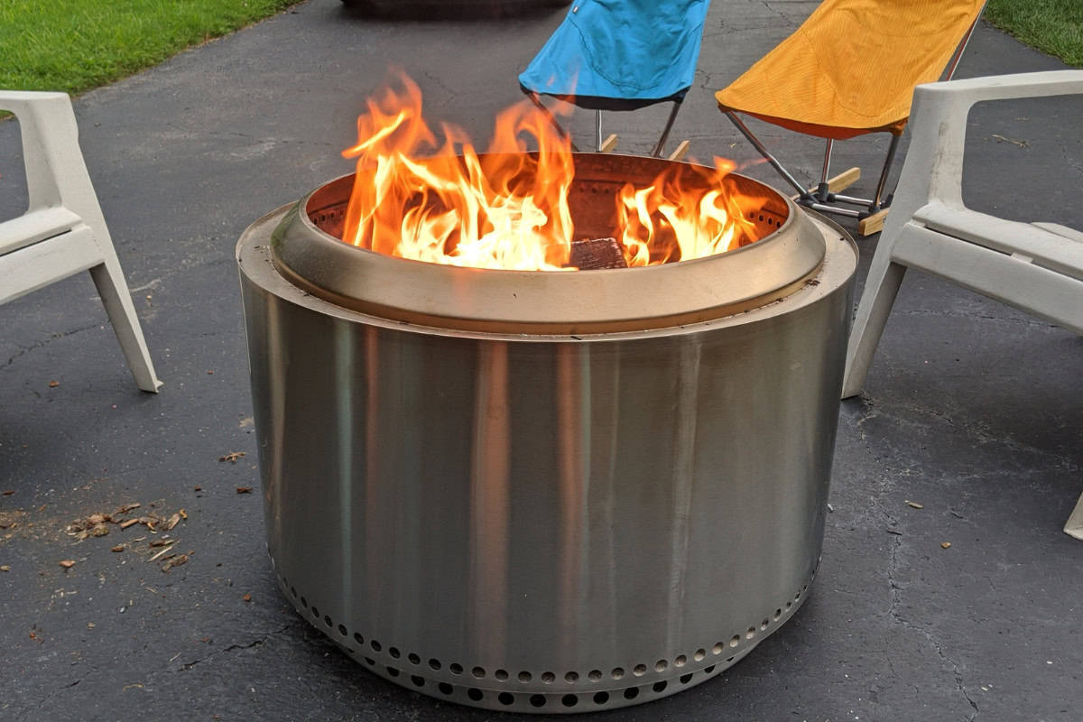 The Details: Why is my Solo Stove Smoking? Image of a Solo Stove Yukon fire pit with a nice non-smoking fire.