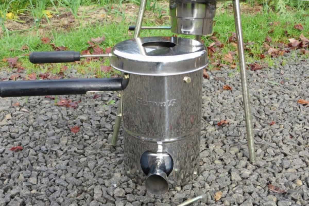 solo-stove-smoking-tlud Image of a TLUD stove on a gravel drive for a blog post about Solo Stove smoking.