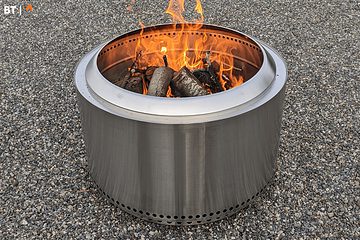 Image of a solo stove yukon on a stone driveway