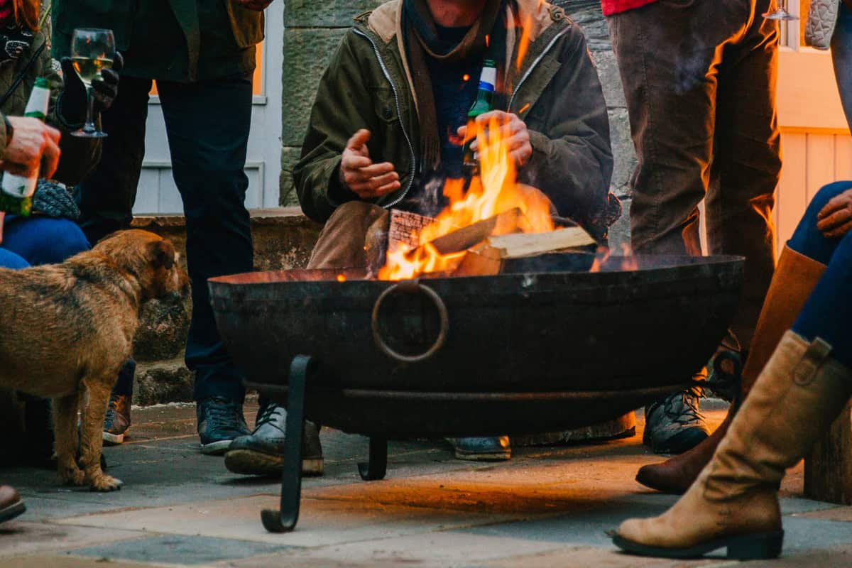 what-is-green-firewood-closing Image of an evening gathering around the fire pit.