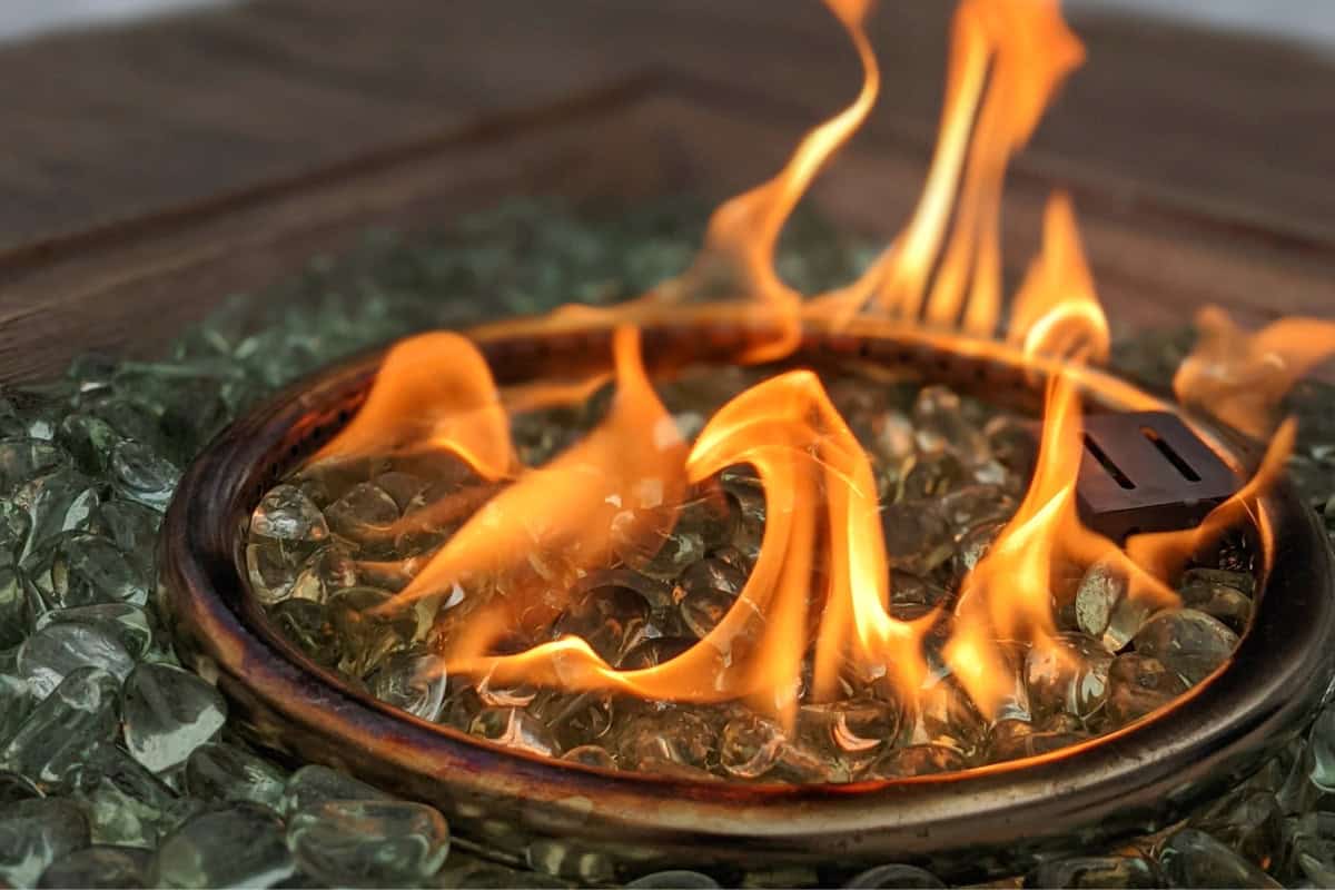 gas-fire-pit-whistles-resources Image of a lit propane fire pit burner for a blog post about gas fire pit whistles.