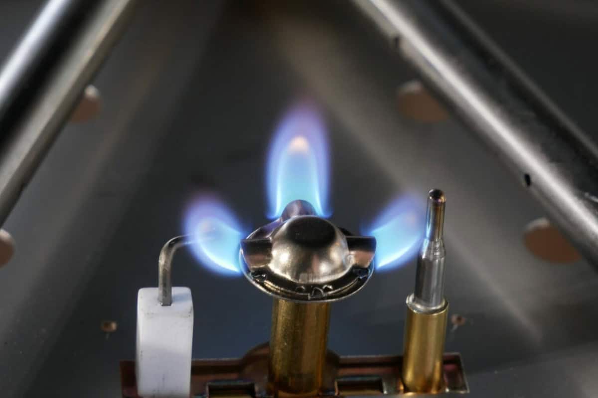 how-do-gas-fire-pits-work-how Image of a gas fire pit's ignition system for a blog post answering the question "how do gas fire pits work?"