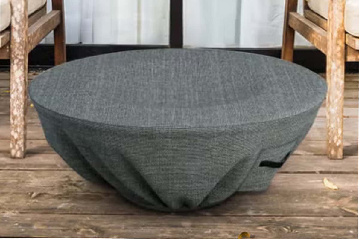 fire-pit-media-recommended Image of a round gas fire bowl with a cover.