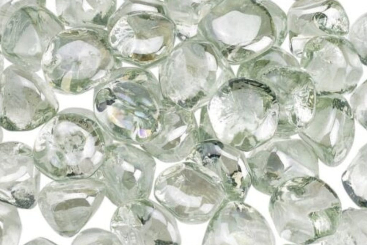 how-to-clean-fire-glass-main Shiny, clear ice cubes with smooth surfaces and rounded edges, perfect for backyard parties and outdoor gatherings.