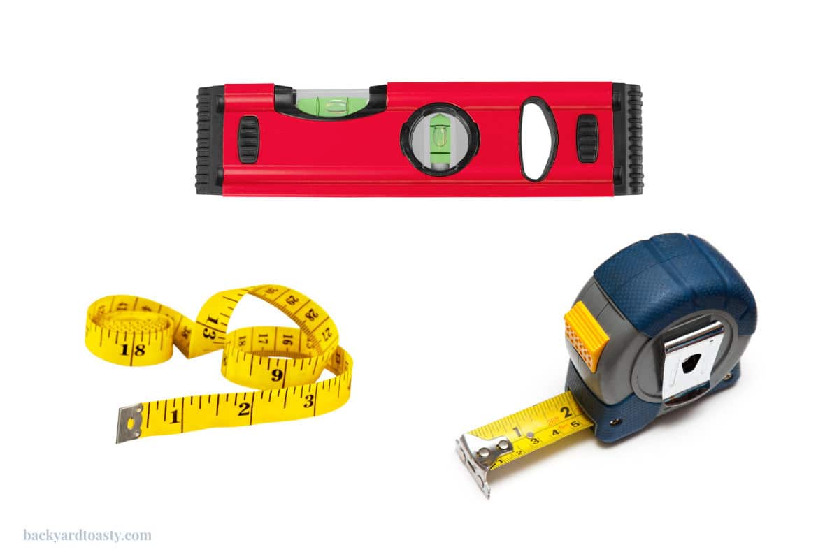 measure-for-a-fire-pit-cover-tools Image of the three measuring tools you'll need, a level, and measuring tapes.
