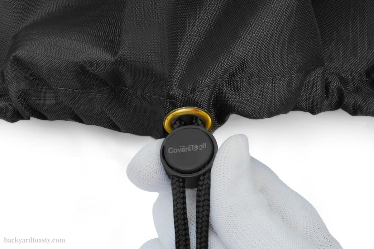 measure-for-a-fire-pit-cover-troubleshooting Image of a cinch for a fire pit cover.