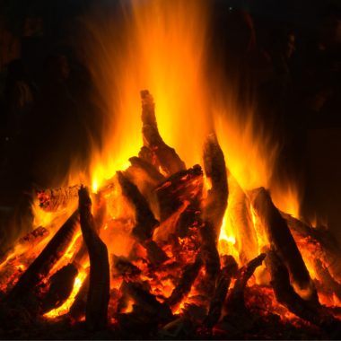 Image of a fire at an fire festival in India for a blog post covering fire pit history.