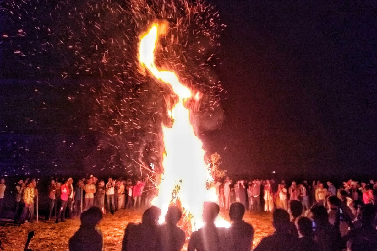 fire-pit-history-traditions-timeline Image of a fire at a Lohri festival in India.