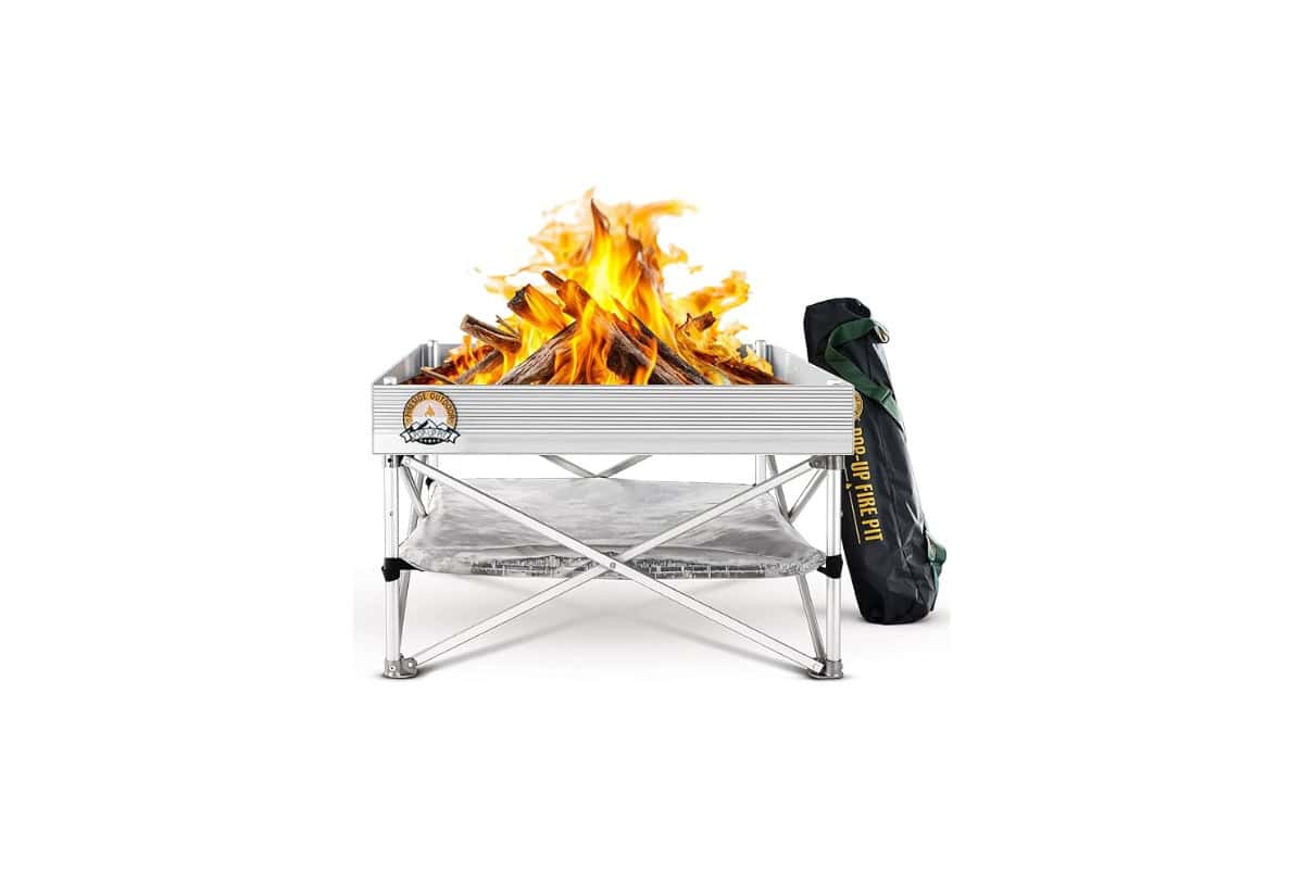 best-portable-fire-pits-fireside-outdoor-pop-up Portable outdoor fire pit with wood burning flames and a safety cover, ideal for backyard gatherings and camping.