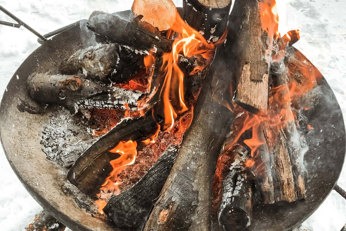 what-are-hardwoods-troublshooting Image of a fire pit burning on a cold winter day.