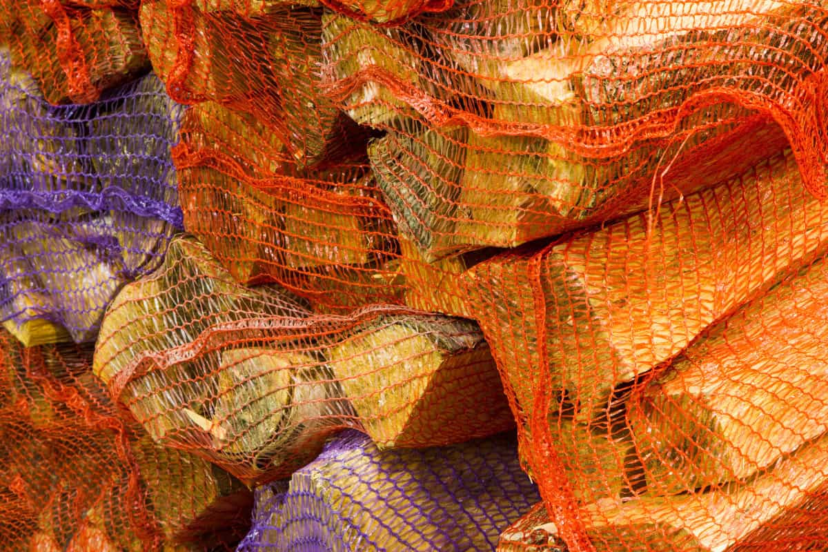 uk-firewood-prices-measurements Image of bagged bundles of firewood for a post on UK firewood prices.